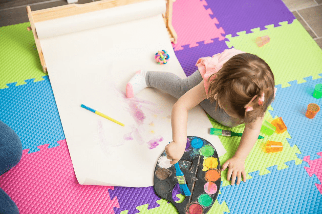 little girl painting.