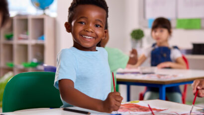 child painting a picture